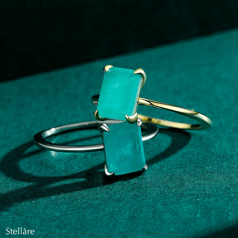 Rectangular turquoise gemstone ring set in 925 sterling silver, available in silver and gold finishes. Elegant, modern, and minimalist style