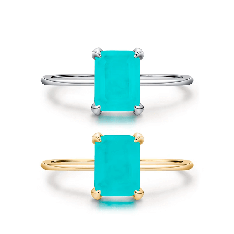 Rectangular turquoise gemstone ring set in 925 sterling silver, available in silver and gold finishes. Elegant, modern, and minimalist style