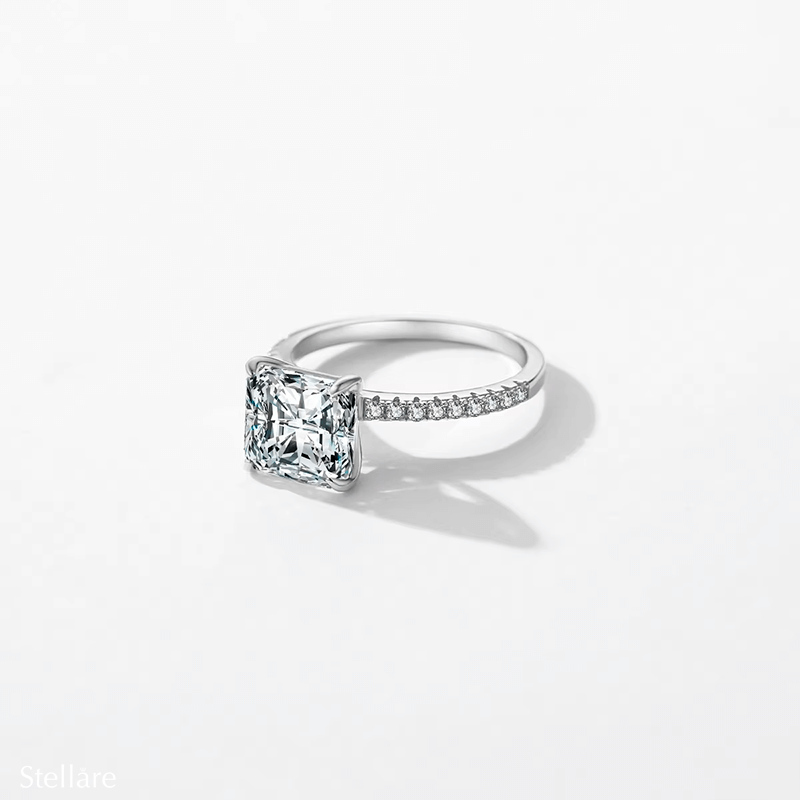 Sterling silver ring with square-cut zirconia stone and pavé band, photographed in different elegant angles and worn on the hand.