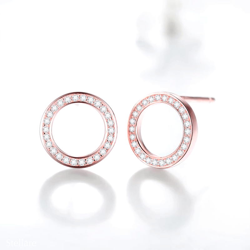 Sterling silver circular stud earrings with zirconia – elegant round shape available in silver or rose gold tone