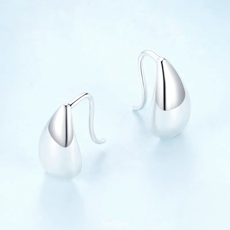 Sterling silver drop earrings with smooth polished teardrop design – minimalist and elegant for daily or formal wear