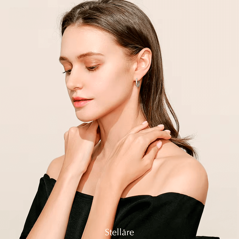 Sterling silver hoop earrings with heart-cut details and zirconia – symbolic, stylish and elegant design for everyday or gifting