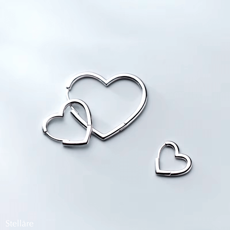 Sterling silver open-heart hoop earrings in three sizes – romantic and minimalist design for daily wear or gifting