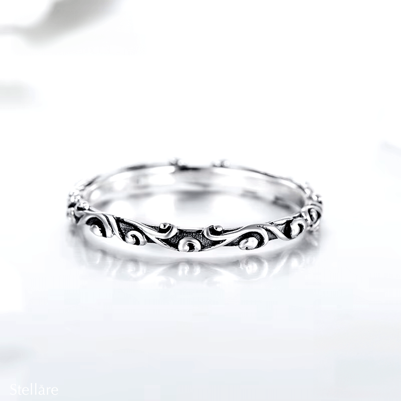 Sterling silver floral ring set with engraved nature-inspired patterns – stackable duo in silver and rose tones for romantic everyday wear