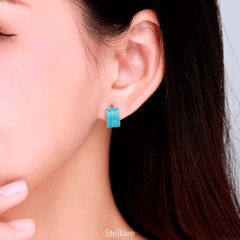 Sterling silver geometric stud earrings with textured turquoise design – bold and modern for elegant everyday looks