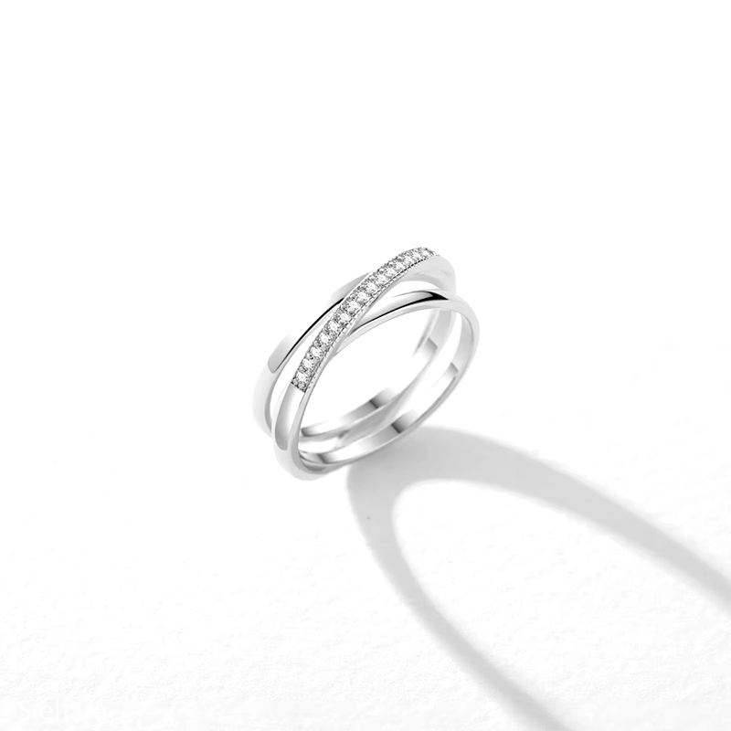 Sterling silver intertwined band ring – twisted pavé and polished design for elegant everyday wear