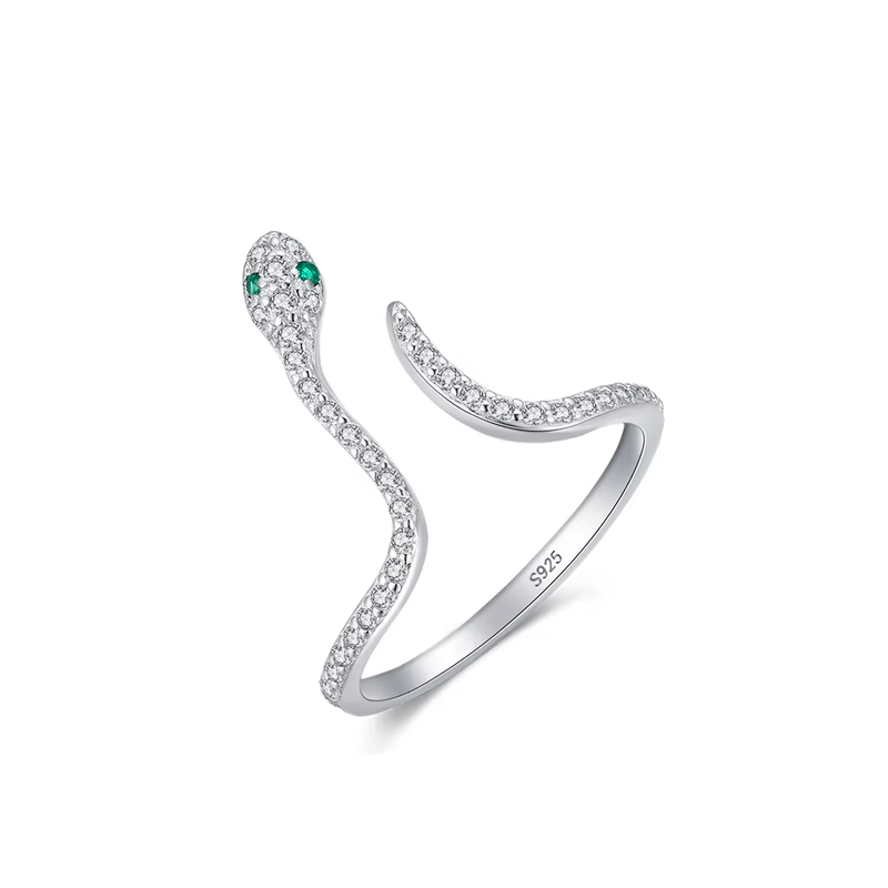 Sterling silver snake ring with pavé zirconia and green stone eyes – bold, symbolic and adjustable design