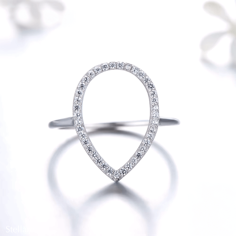 Sterling silver teardrop ring with pavé zirconia – modern open band design in silver or rose gold