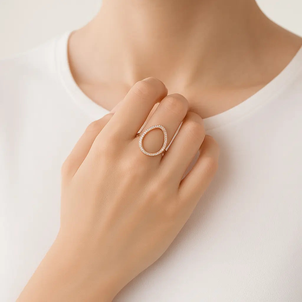Sterling silver teardrop ring with pavé zirconia – modern open band design in silver or rose gold