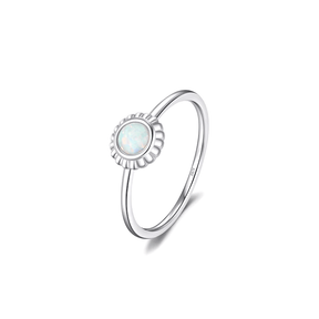 Colorful 925 sterling silver gemstone rings with heart, round, and baguette stones, worn in combination or shown individually