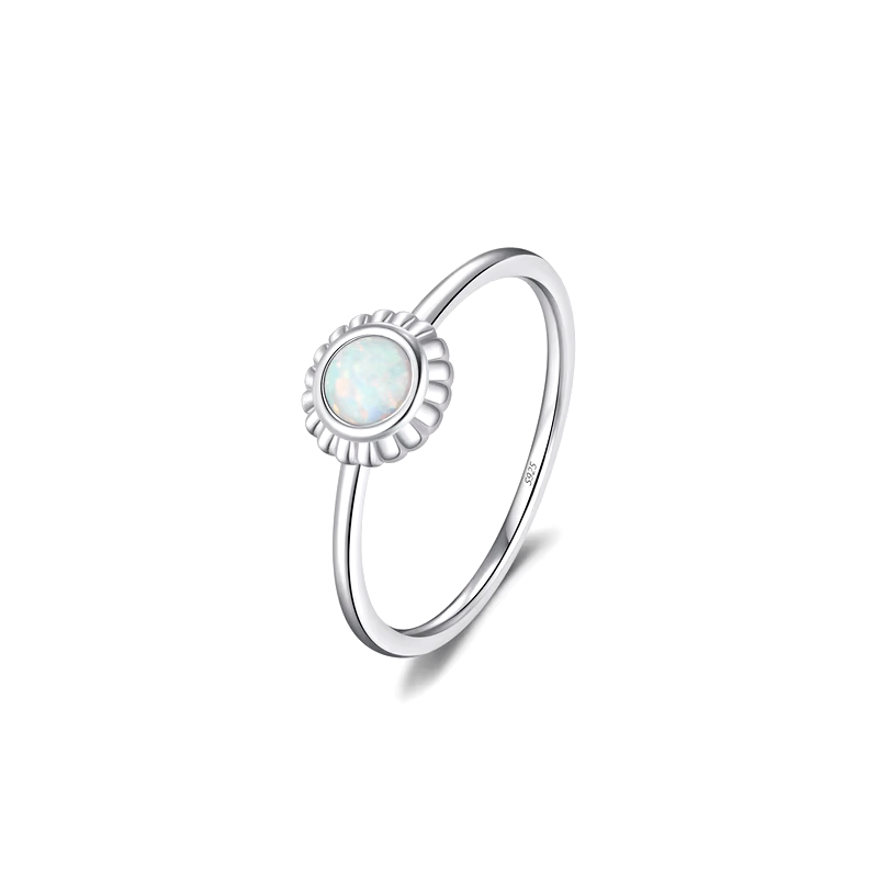 Colorful 925 sterling silver gemstone rings with heart, round, and baguette stones, worn in combination or shown individually