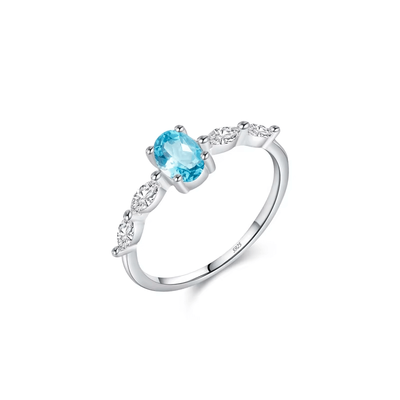 Colorful 925 sterling silver gemstone rings with heart, round, and baguette stones, worn in combination or shown individually