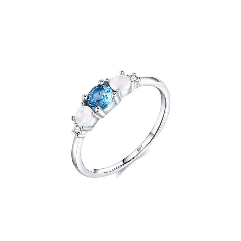 Colorful 925 sterling silver gemstone rings with heart, round, and baguette stones, worn in combination or shown individually