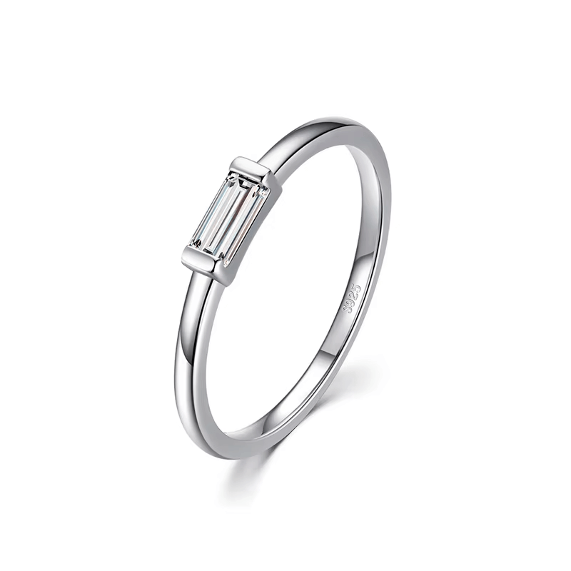 925 sterling silver rings collection featuring minimalist and delicate band designs with small zirconia details, displayed individually and in sets