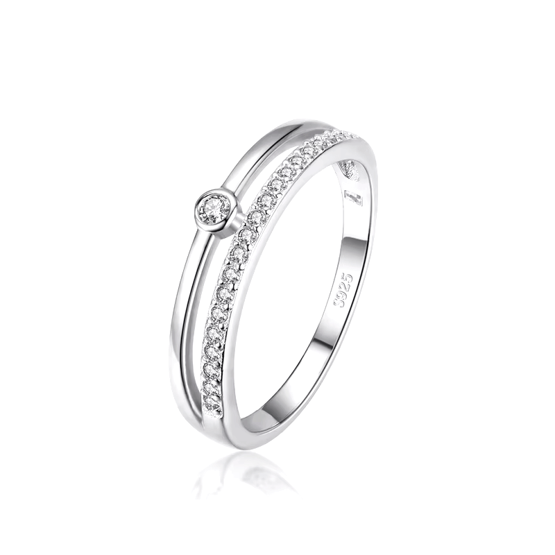 925 sterling silver rings collection featuring minimalist and delicate band designs with small zirconia details, displayed individually and in sets