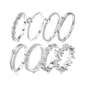 925 sterling silver rings collection featuring minimalist and delicate band designs with small zirconia details, displayed individually and in sets