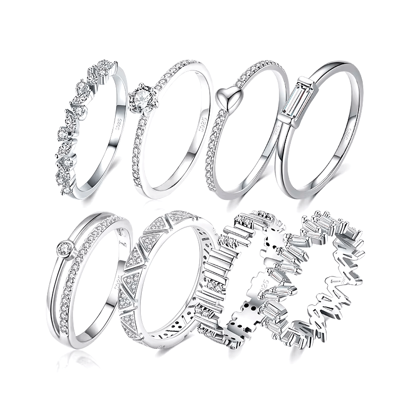 925 sterling silver rings collection featuring minimalist and delicate band designs with small zirconia details, displayed individually and in sets