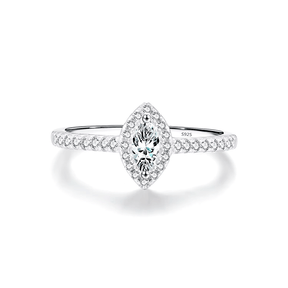 Sterling silver ring with marquise-cut zirconia centerpiece and pavé band, photographed in elegant settings and on hand.