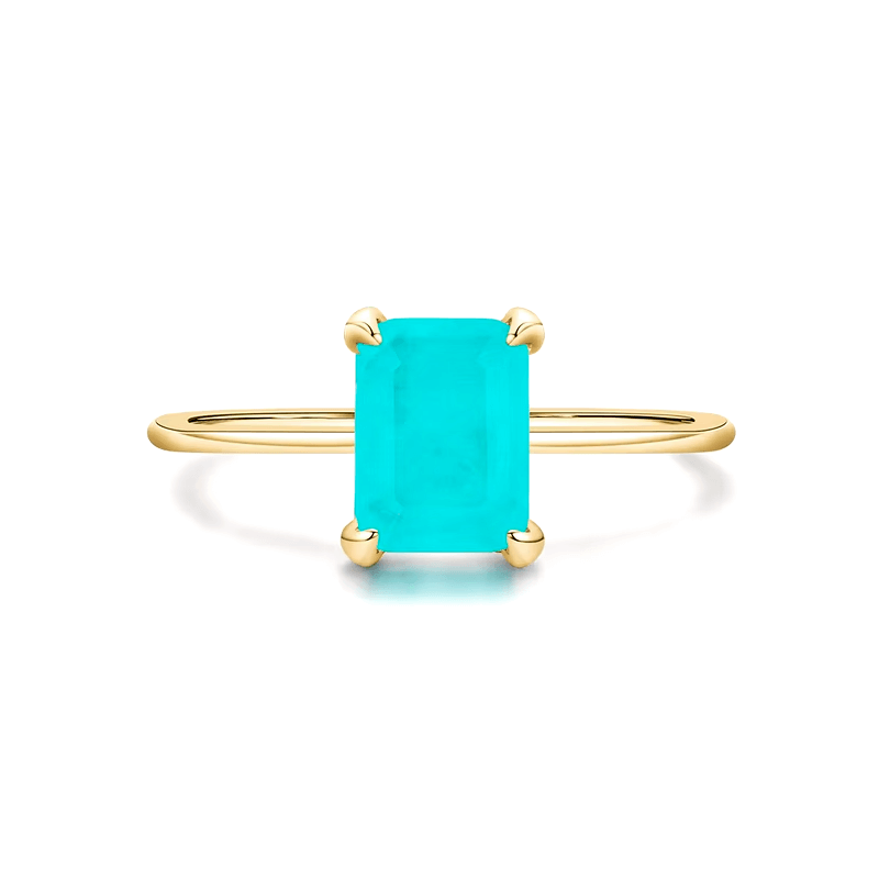 Rectangular turquoise gemstone ring set in 925 sterling silver, available in silver and gold finishes. Elegant, modern, and minimalist style