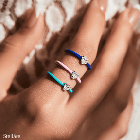 Vibrant candy-style rings in 925 sterling silver, available in multiple pastel colours with enamel finish and zirconia details, ideal for stacking or solo wear