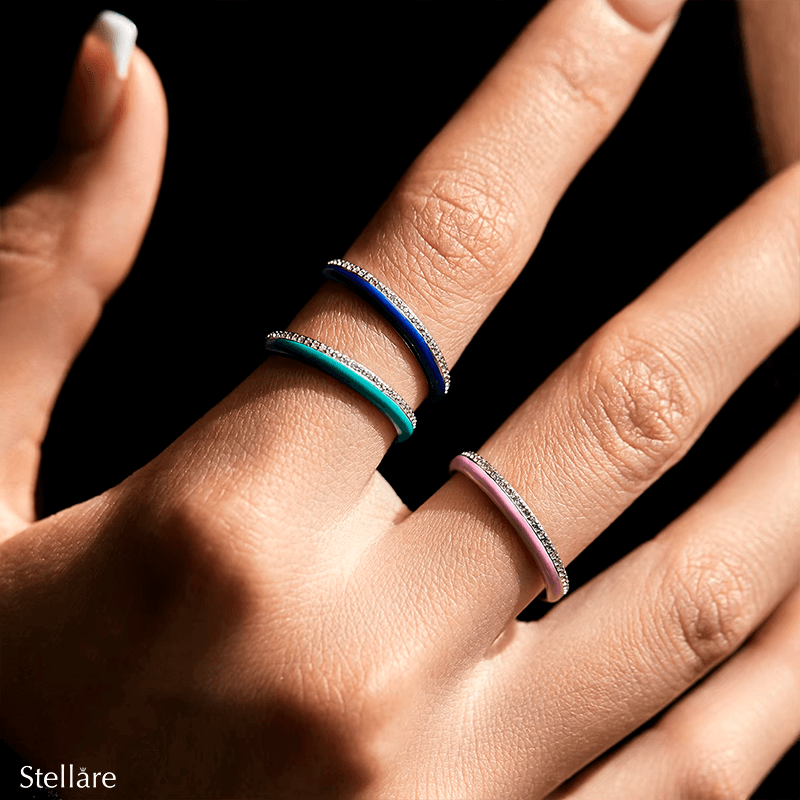 Vibrant candy-style rings in 925 sterling silver, available in multiple pastel colours with enamel finish and zirconia details, ideal for stacking or solo wear