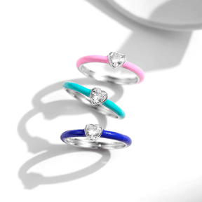 Vibrant candy-style rings in 925 sterling silver, available in multiple pastel colours with enamel finish and zirconia details, ideal for stacking or solo wear