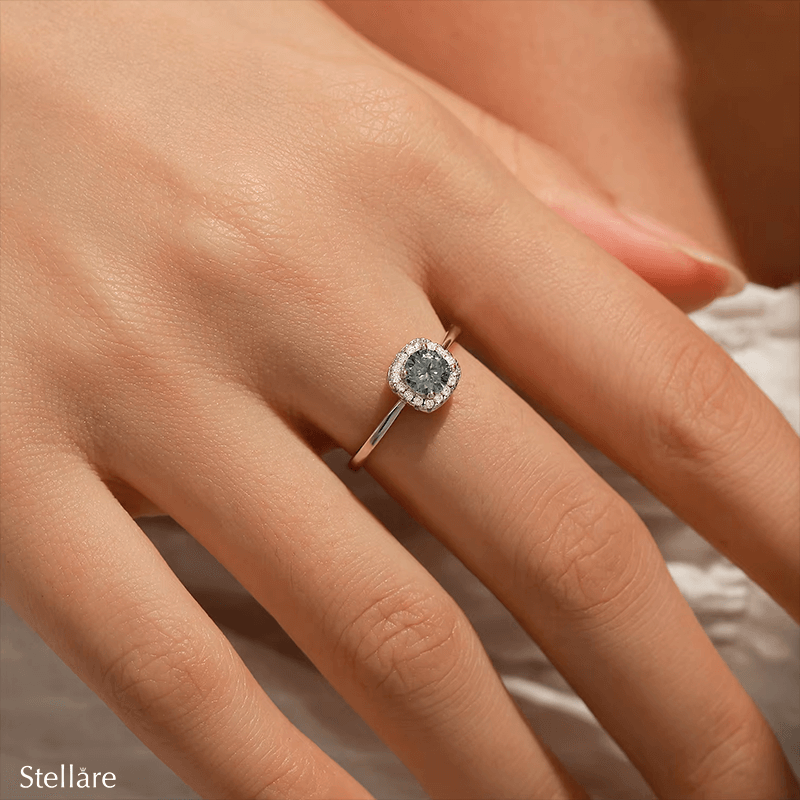 925 sterling silver halo ring with central zirconia and delicate pavé setting, shown on hand and in luxury close-up photography
