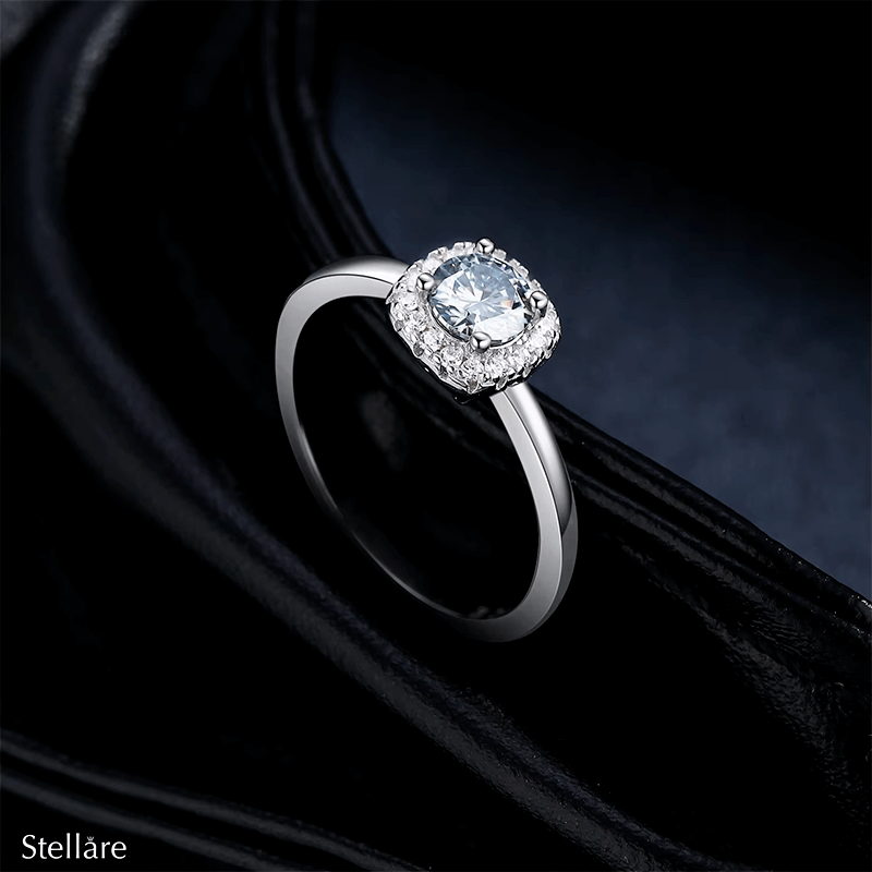 925 sterling silver halo ring with central zirconia and delicate pavé setting, shown on hand and in luxury close-up photography
