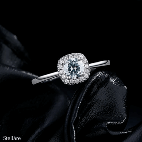925 sterling silver halo ring with central zirconia and delicate pavé setting, shown on hand and in luxury close-up photography