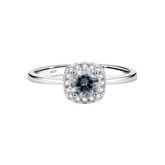 925 sterling silver halo ring with central zirconia and delicate pavé setting, shown on hand and in luxury close-up photography