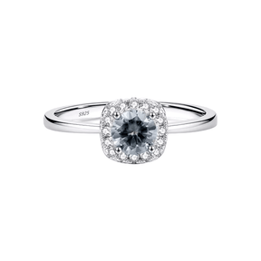 925 sterling silver halo ring with central zirconia and delicate pavé setting, shown on hand and in luxury close-up photography