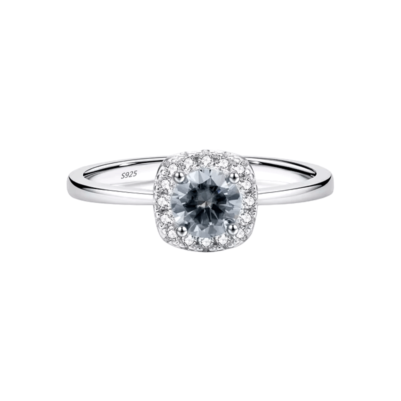 925 sterling silver halo ring with central zirconia and delicate pavé setting, shown on hand and in luxury close-up photography