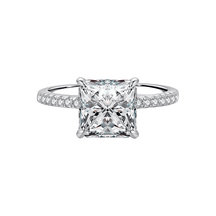 Sterling silver ring with square-cut zirconia stone and pavé band, photographed in different elegant angles and worn on the hand.