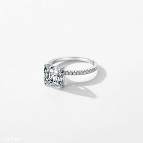 Sterling silver ring with square-cut zirconia stone and pavé band, photographed in different elegant angles and worn on the hand.