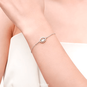 925 sterling silver bracelet with a central luminous opal stone and celestial-inspired design