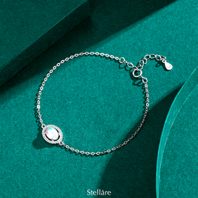 925 sterling silver bracelet with a central luminous opal stone and celestial-inspired design