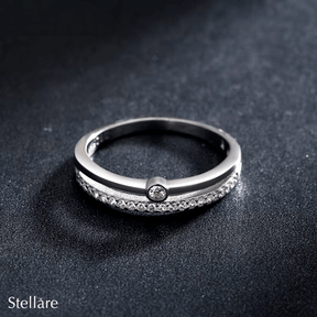 “Sterling silver curved ring with solitaire cubic zirconia – elegant minimalist band for daily wear”
