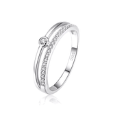 “Sterling silver curved ring with solitaire cubic zirconia – elegant minimalist band for daily wear”

