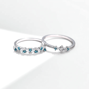“Sterling silver ring set with blue zirconia – delicate and stackable duo for elegant everyday wear or gifting”