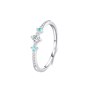 “Sterling silver ring set with blue zirconia – delicate and stackable duo for elegant everyday wear or gifting”
