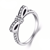 “Sterling silver bow ring with pavé zirconia stones – romantic and feminine jewellery piece for women”