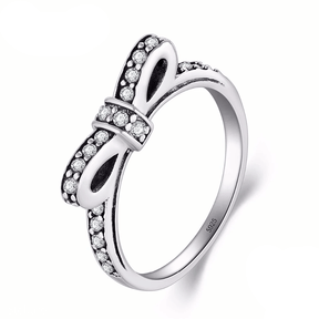 “Sterling silver bow ring with pavé zirconia stones – romantic and feminine jewellery piece for women”