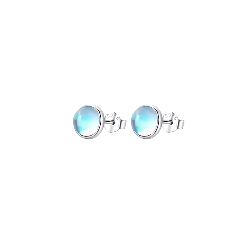 Sterling silver stud earrings with luminous blue stones – celestial-inspired design for elegance and serenity