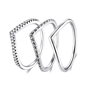 Sterling silver chevron ring set – minimalist trio with v-shaped and pavé bands for stacking or solo wear