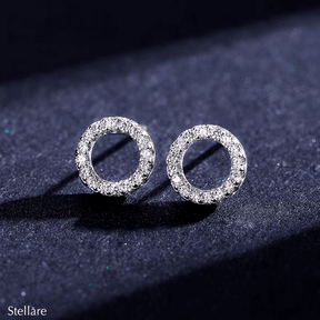 Sterling silver round stud earrings with sparkling zirconia – minimalist circle design for luminous everyday style