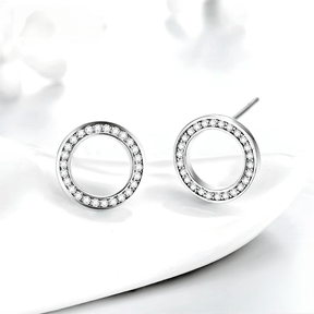 Sterling silver circular stud earrings with zirconia – elegant round shape available in silver or rose gold tone