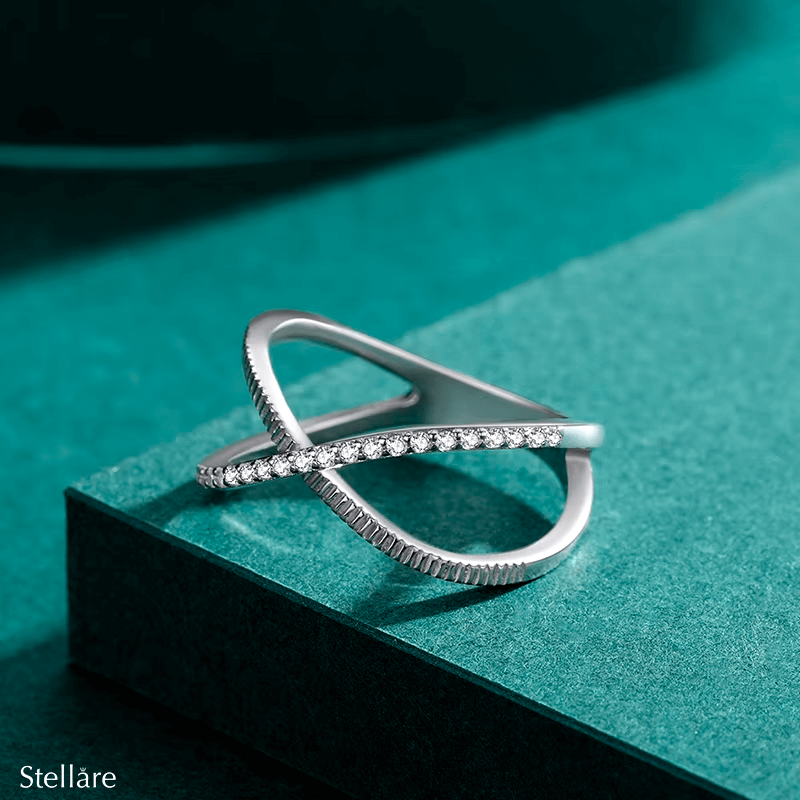 Sterling silver criss cross ring with pavé zirconia – modern crossover design for elegant everyday wear