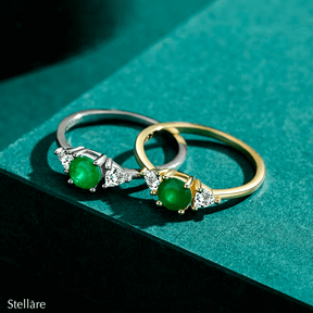 Sterling silver emerald ring set with vibrant green stones – elegant and stackable two-piece design for stylish gifting