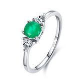 Sterling silver emerald ring set with vibrant green stones – elegant and stackable two-piece design for stylish gifting