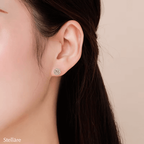 Sterling silver stud earrings with round halo design and white zirconia – timeless sparkle for everyday elegance